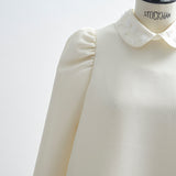 SAKURAビジューブラウス